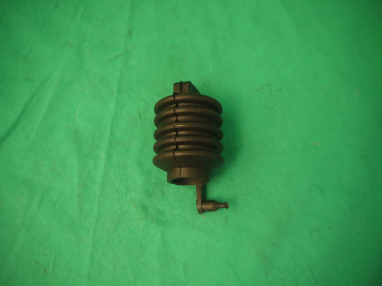 Gummibalg zwischen Verbindungsstange und Getriebe